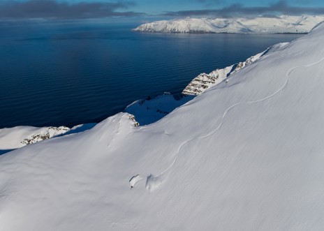 Heli-ski all morning, then have lunch at our riverside Airstream base camp where you’ll swap skis fo